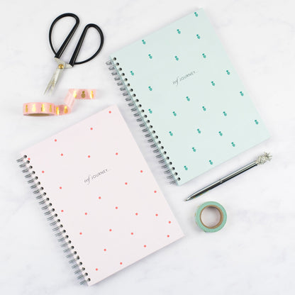 the pink spot ivf journey planner and mint pineapple ivf journey planner by nothing but lovely