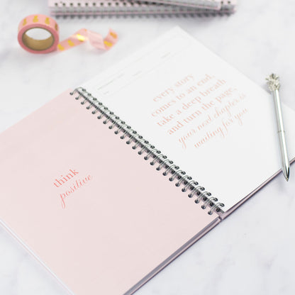 And inside spread in the IVF Planner, both pages have quotes on them, one says "Think Positive" and the other says "Every story comes to an end, take a deep breath and turn the page, your next chapter is waiting for you"