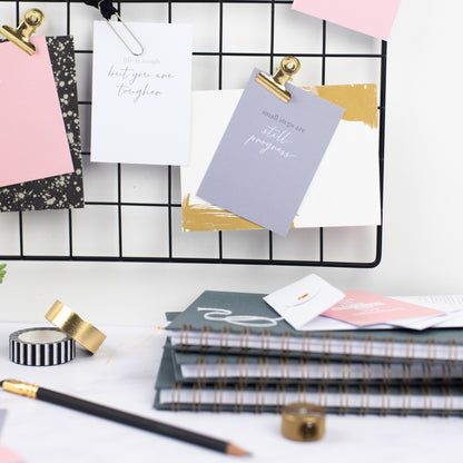 small steps card on a memo board